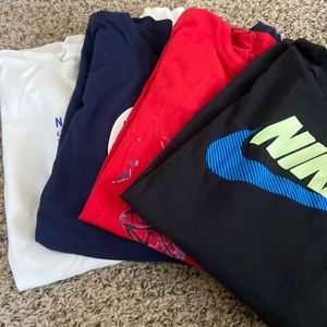 Nike bundled assorted shirts. Blue black white and red. Xxl